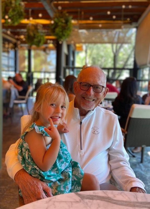 Tom Johnson and granddaughter Kate at Bayside Restaurant, Newport Beach, Calif., in an undated photo. (Courtesy of Tom Johnson)