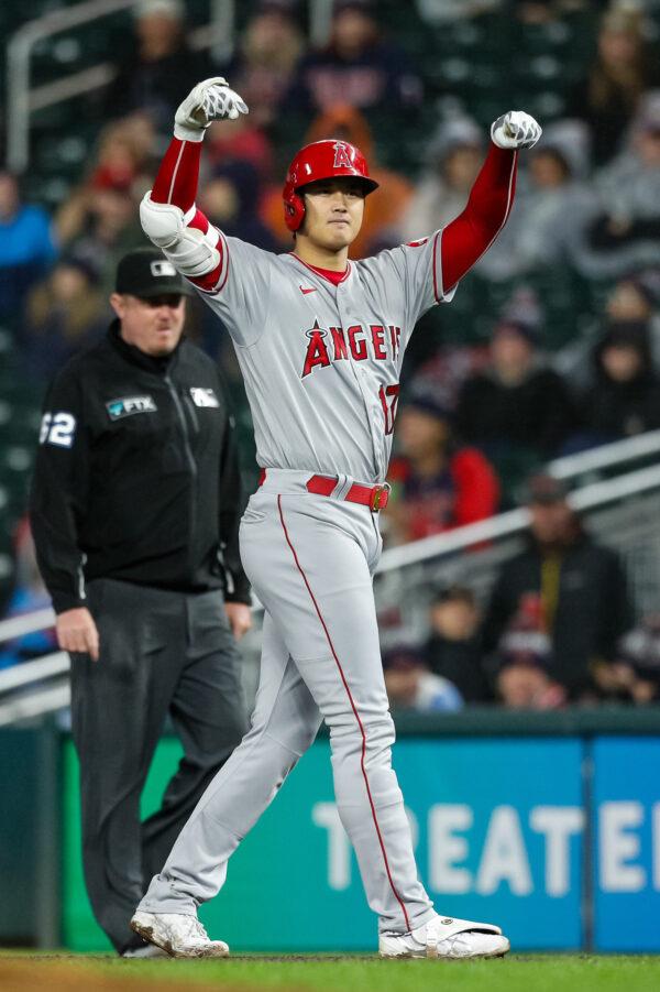 Shohei Ohtani (17) of the Los Angeles Angels celebrates his RBI single against the Minnesota Twins in the seventh inning of the game at Target Field in Minneapolis, on Sept. 23, 2022. (David Berding/Getty Images)