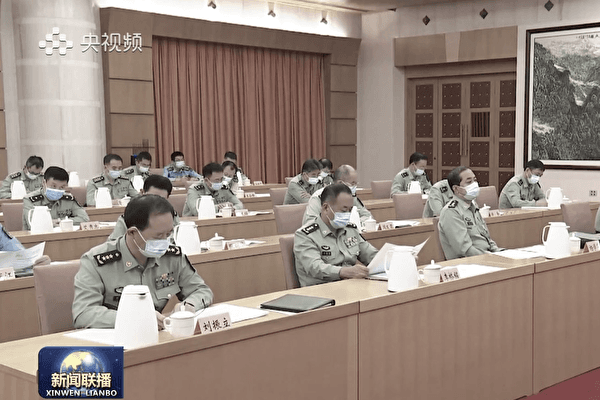 The Chinese Communist Party held a seminar on National Defense and Military Reform in Beijing on Sept. 21. Sitting on the left in the front row is Liu Zhenli, commander of the People’s Liberation Army (PLA) Ground Force, while to his left is Li Qiaoming, former commander of China's Northern Theater Command. (Screenshot via The Epoch Times)