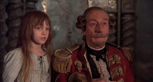 Sally Salt (Sarah Polley) and Baron Munchausen (John Neville) in “The Adventures of Baron Munchausen.” (Columbia Pictures)