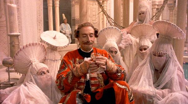 Baron Munchausen (John Neville) being lavishly entertained at the Ottoman court, in “The Adventures of Baron Munchausen.” (Columbia Pictures)