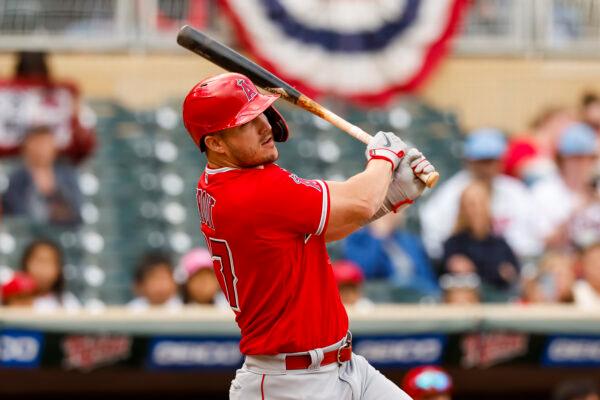 Mike Trout of the L.A. Angels hits a double against the Minnesota Twins in the ninth inning of the game at Target Field in Minneapolis, on Sept. 25, 2022. (David Berding/Getty Images)