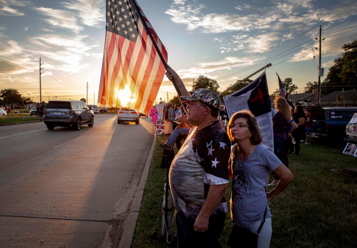 Protesters against the "sexualization of children" demonstrate at a "family-friendly" drag bingo event at First Christian Church in Katy, Texas, on Sept. 24, 2022. (Bobby Sanchez/The Epoch Times)