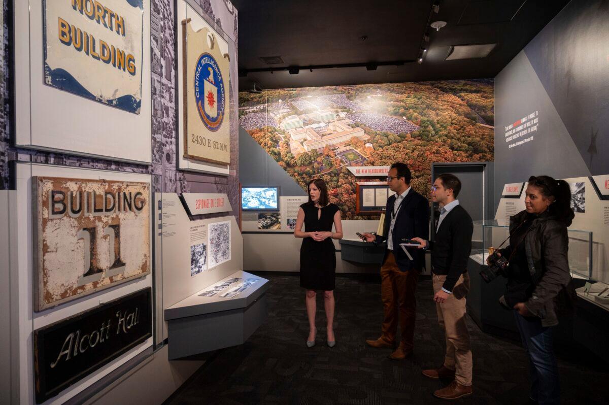 Deputy Director for the Museum in the Central Intelligence Agency Janelle Neises gives a group of journalists a tour of the refurbished museum in the CIA headquarters building in Langley, Va., on Sept. 24, 2022. (Kevin Wolf/AP Photo)