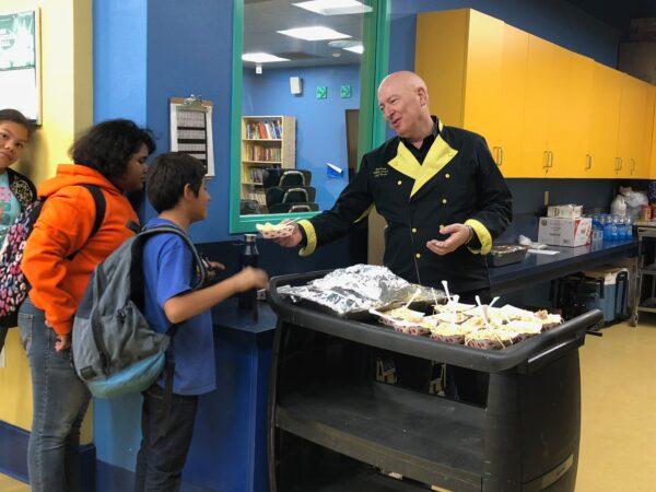 Chef Bruno Serato serves meals to children at the Boys and Girls Club of Anaheim in Anaheim, Calif. (Courtesy of Bruno Serato)