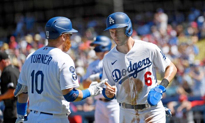 Grove Helps Dodgers Beat Cardinals 4–1 to Clinch Top NL Seed