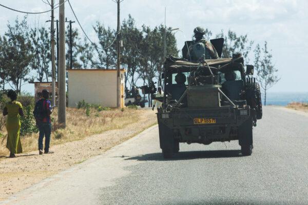 A military convoy of South Africa National Defence Forces patrols in Pemba on Aug. 5, 2021. The Southern African Development Community bloc is rallying behind neighboring Mozambique, sending troops to battle jihadists wreaking havoc in the gas-rich north. (Alfredo Zuniga/AFP via Getty Images)