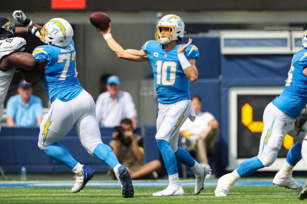 Justin Herbert (10) of the Los Angeles Chargers attempts a pass against the Jacksonville Jaguars at SoFi Stadium in Inglewood, Calif., on Sept. 25, 2022. (Sean M. Haffey/Getty Images)
