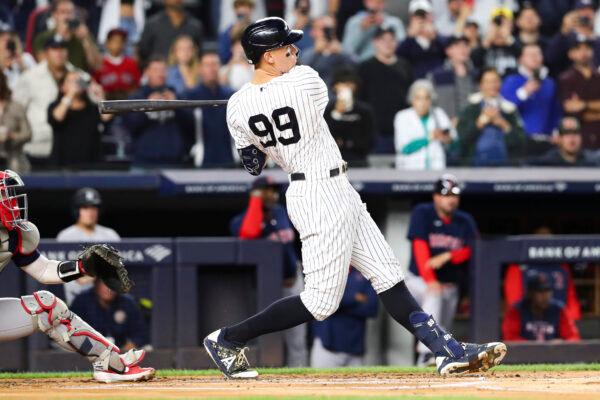 New York Yankees designated hitter Aaron Judge follows through on a double against Boston Red Sox starting pitcher Brayan Bello during the first inning of a baseball game in New York, Sept. 25, 2022. (Jessie Alcheh/AP Photo)