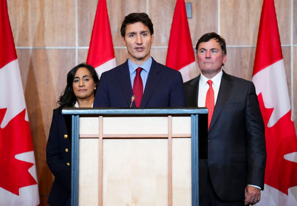 Prime Minister Justin Trudeau is joined by Minister of National Defence Anita Anand and Minister of Intergovernmental Affairs, Infrastructure, and Communities Dominic LeBlanc as they hold a press conference in Ottawa on Sept. 26, 2022. (Sean Kilpatrick/The Canadian Press)