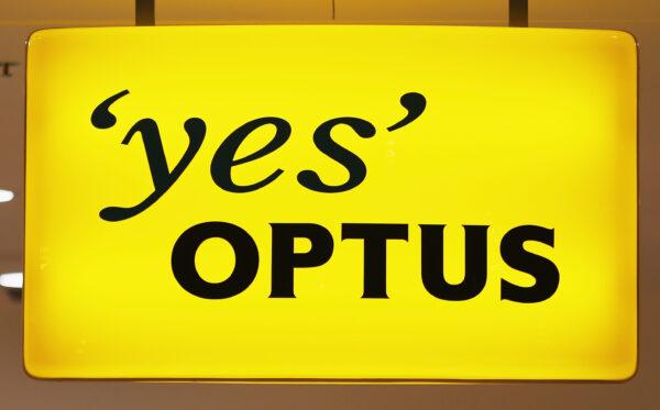 A 'Yes Optus' sign hangs outside of an Optus store in Melbourne, Australia, on April 30, 2014 . (Scott Barbour/Getty Images)