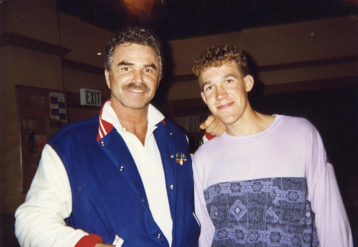 David A.R. White (R) as a young actor in the 1990s, with his mentor, Burt Reynolds. (Courtesy of David A.R. White)