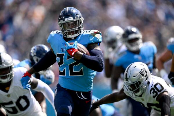 Tennessee Titans running back Derrick Henry (22) carries the ball against the Las Vegas Raiders in the first half of an NFL football game in Nashville, on Sept. 25, 2022. (John Amis/AP Photo)