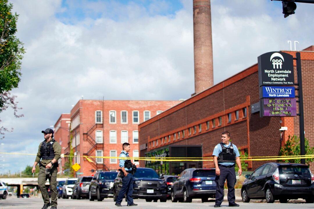 Man Shot, Officer Injured in Chicago Police Facility Incident