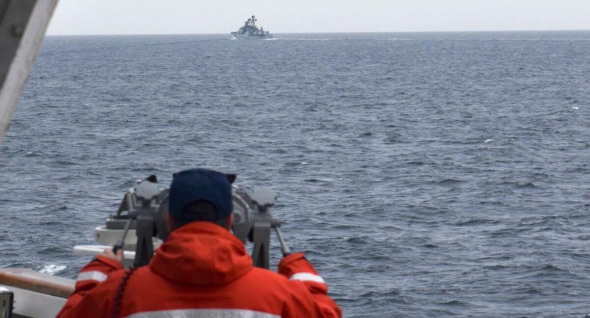 A Coast Guard crew member observes a vessel in the Bering Sea on Sept. 19, 2022. (US Coast Guard)