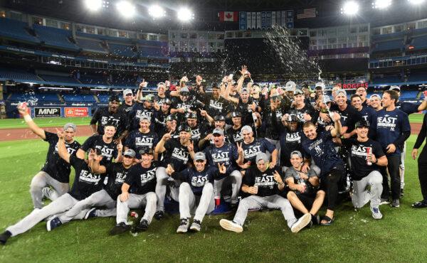 <br/>The New York Yankees pose for a team photo after defeating the Toronto Blue Jays to clinch the American League East division title at Rogers Centre in Toronto on Sept. 27, 2022. (Dan Hamilton/USA TODAY Sports)