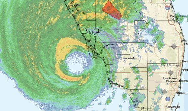 A 12 p.m. National Hurricane Center update on Sept. 28, 2022, shows Hurricane Ian's eyewall approaching Florida's coast. (NHC)
