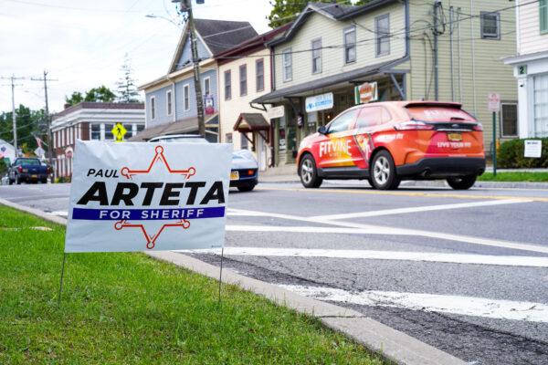 A lawn sign shows support for Paul Arteta in downtown Montgomery, N.Y., on Sept. 27, 2022. (Cara Ding/The Epoch Times)