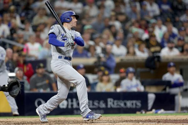 Freddie Freeman (5) of the Los Angeles Dodgers connects for an RBI single during the tenth inning of a game at PETCO Park in San Diego, on Sept. 28, 2022. (Sean M. Haffey/Getty Images)