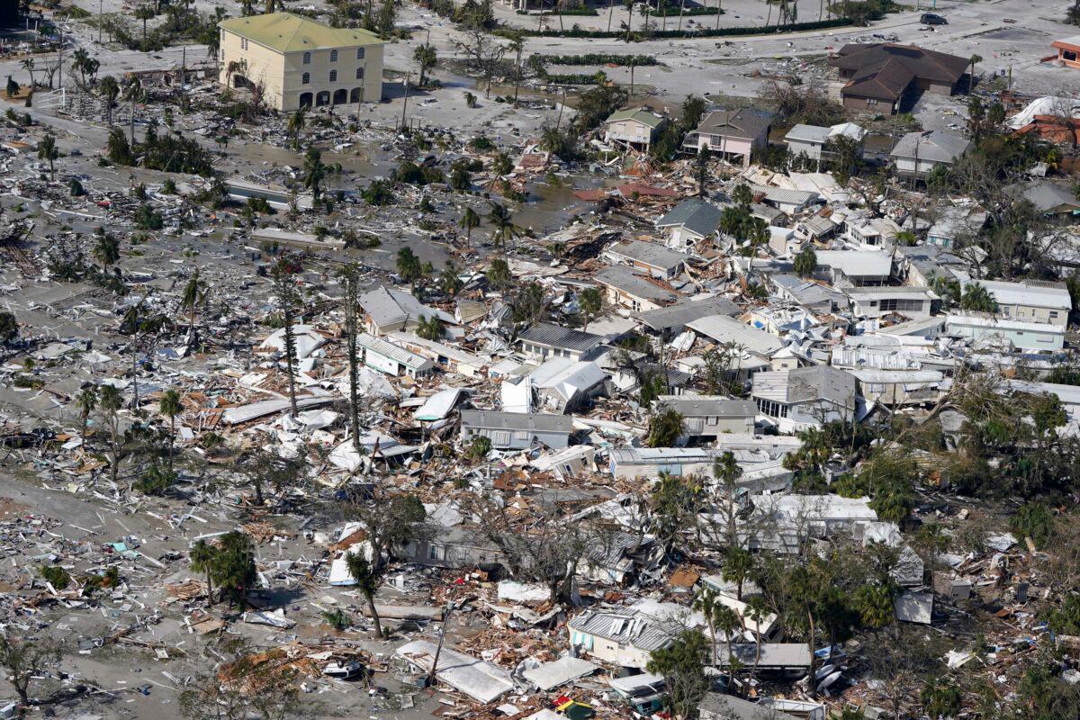 Damaged homes and debris are shown in the aftermath of Hurricane Ian, in Fort Myers, Fla., on Sept. 29, 2022. (Wilfredo Lee/AP Photo)