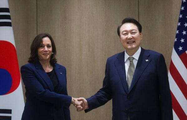 U.S. Vice President Kamala Harris and South Korea's President Yoon Suk Yeol pose for a photo as they hold a bilateral meeting in Seoul, South Korea, on Sept. 29, 2022. (Leah Millis/Pool Photo via AP)