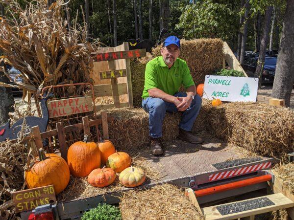 Army veteran Ray Parnell with his farm-grown pumpkins at Dirtbag Ales in Hope Mills, North Carolina, in 2020. (Courtesy of Jenny Bell)