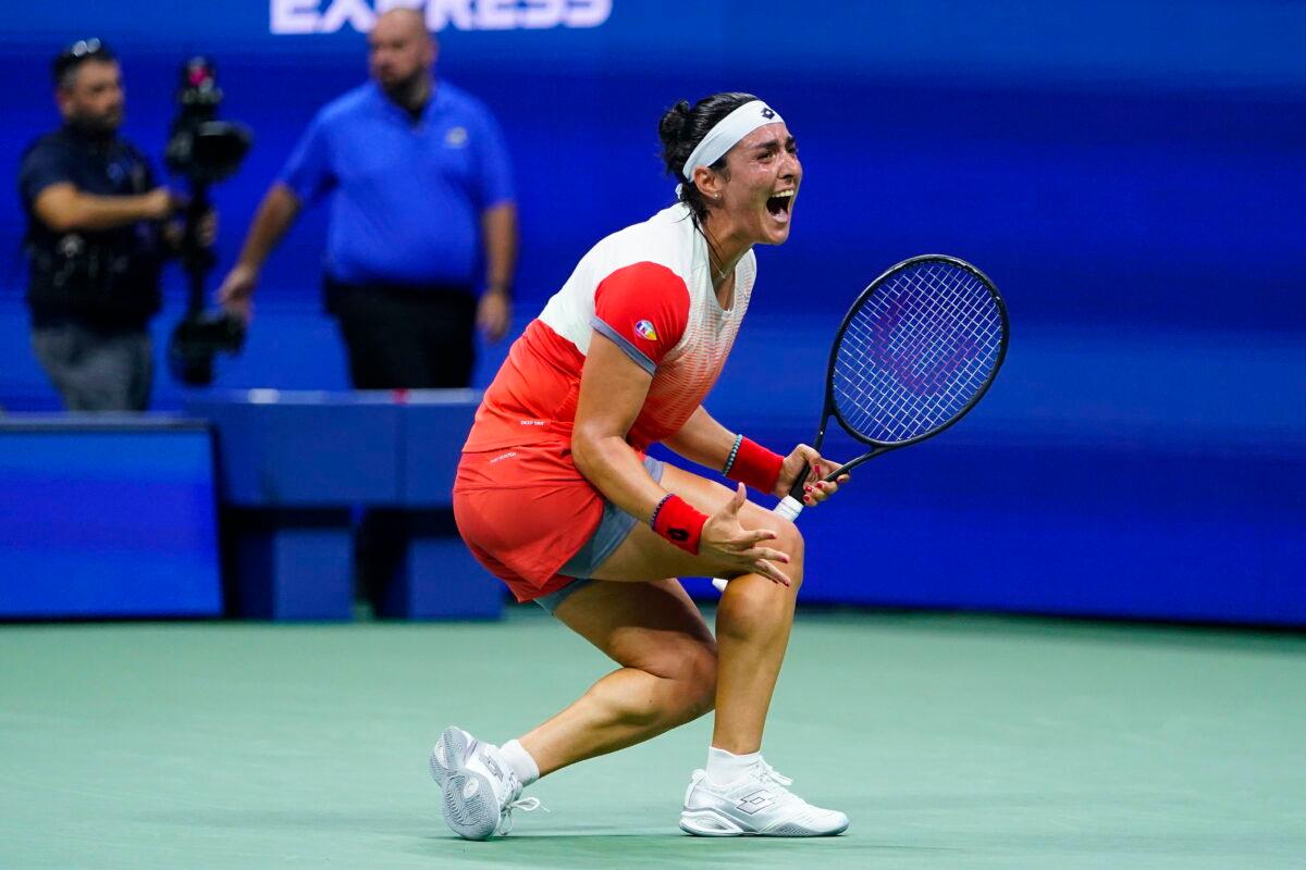 Ons Jabeur of Tunisia reacts after defeating Caroline Garcia of France during the semifinals of the U.S. Open tennis championships in New York on Sept. 8, 2022. (Frank Franklin II/AP Photo)