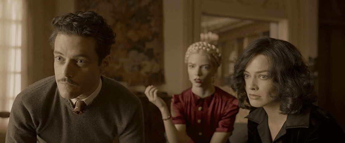 The big-name supporting cast of “Amsterdam” includes Rami Malek and Anya Taylor-Joy as a grating husband and wife, in "Amsterdam." (20th Century Studios)