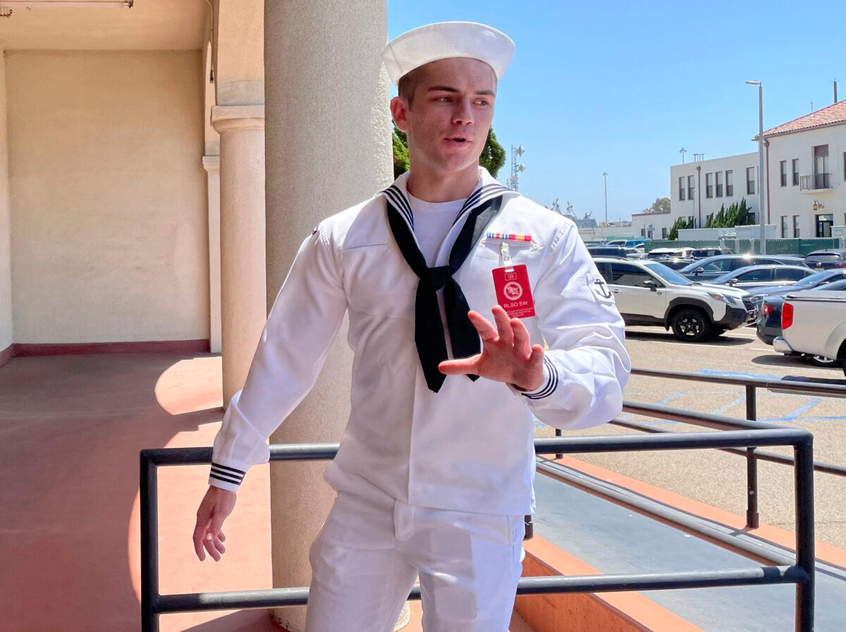 U.S. Navy sailor Ryan Sawyer Mays walks past reporters at Naval Base San Diego before entering a Navy courtroom in San Diego on Aug. 17, 2022. (Julie Watson/AP Photo)
