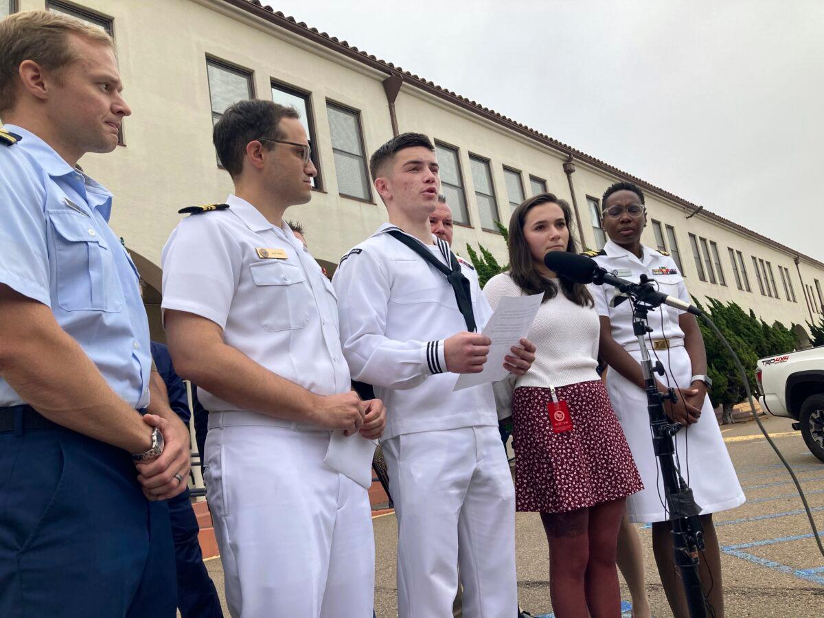 Navy sailor Ryan Sawyer Mays (C) reads a statement after his acquittal in San Diego on Sept. 30, 2022. (Elliot Spagat/AP Photo)