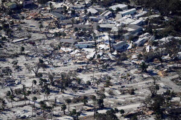 In this aerial photo made in a flight provided by mediccorps.org, damage from Hurricane Ian is seen on Estero Island in Fort Myers Beach, Fla., on Sept. 30, 2022. (Gerald Herbert/AP Photo)