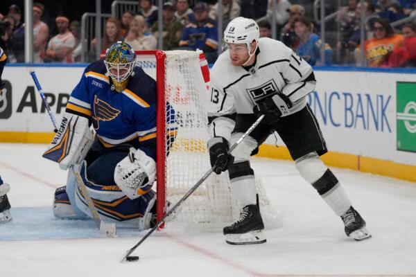 Los Angeles Kings' Gabriel Vilardi (13) controls the puck as St. Louis Blues goaltender Thomas Greiss defends during the third period of an NHL hockey game in St. Louis, Oct. 31, 2022. (Jeff Roberson/AP Photo)
