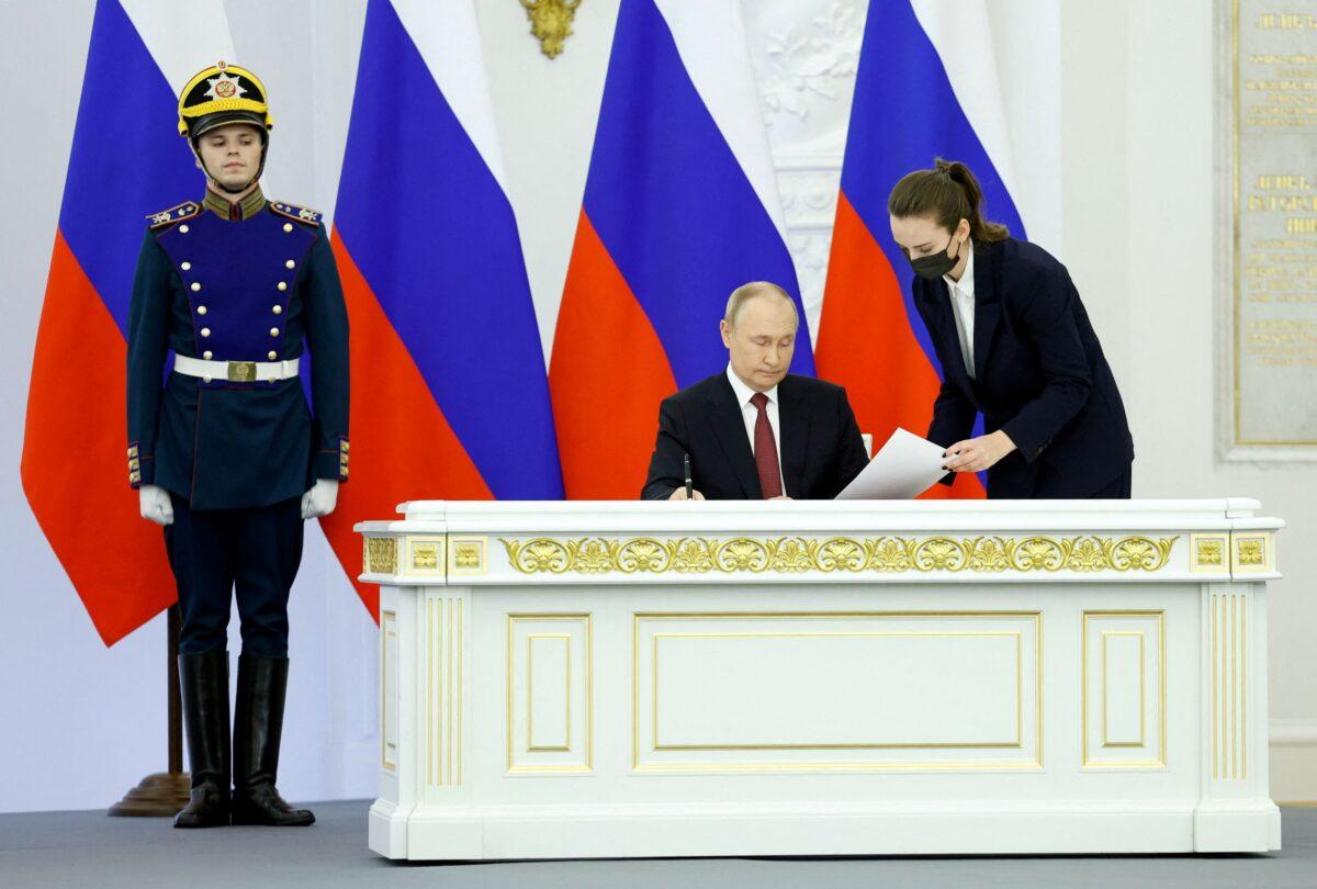 Russian President Vladimir Putin attends a ceremony to declare the annexation of the Russian-controlled territories of four Ukraine's Donetsk, Luhansk, Kherson and Zaporizhzhia regions in the Georgievsky Hall of the Great Kremlin Palace in Moscow, Russia, Sept. 30, 2022. (Dmitry Astakhov/Sputnik/Pool via Reuters)