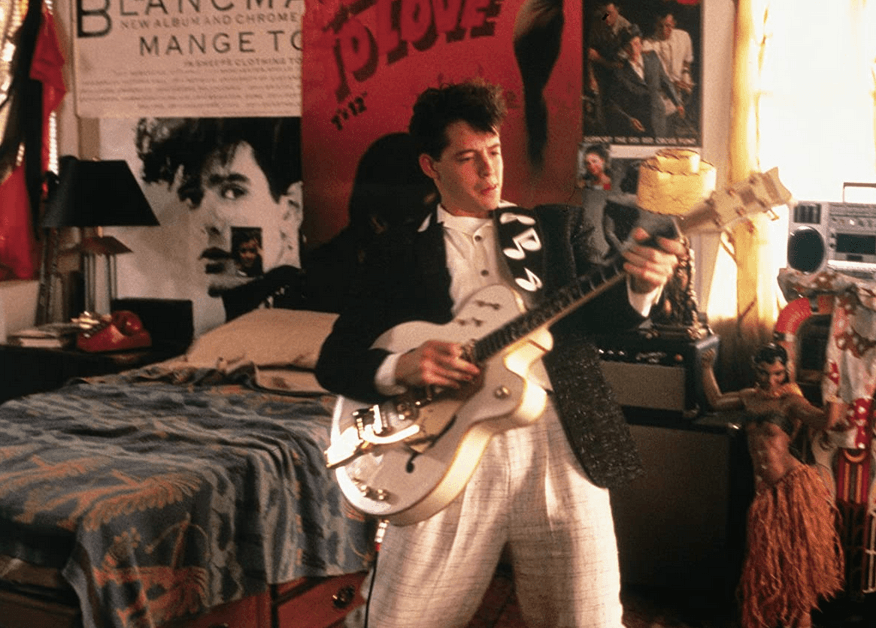 Ferris Bueller (Matthew Broderick) can't play the guitar but has fun, in "Ferris Bueller's Day Off." (Paramount Pictures)