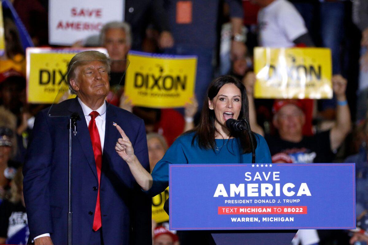 Tudor Dixon (R), the Republican candidate for Michigan Governor, speaks alongside former President Donald Trump during a Save America rally at Macomb County Community College Sports and Expo Center in Warren, Michigan, on Oct. 1, 2022. (Jeff Kowalsky/AFP via Getty Images)