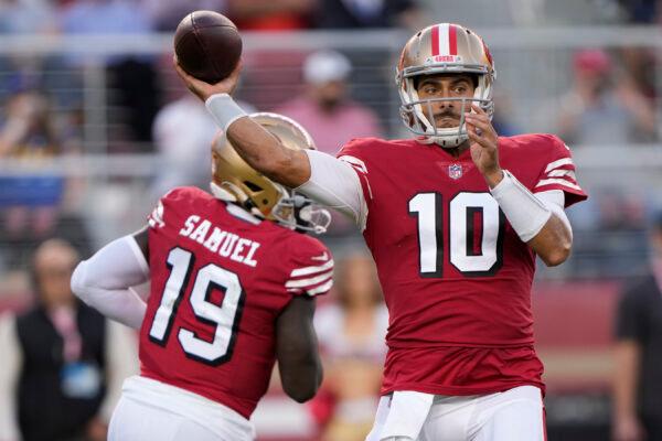 Quarterback Jimmy Garoppolo (10) of the San Francisco 49ers throws a pass against the Los Angeles Rams during the second quarter at Levi's Stadium in Santa Clara, Calif., on Oct. 3, 2022. (Thearon W. Henderson/Getty Images)