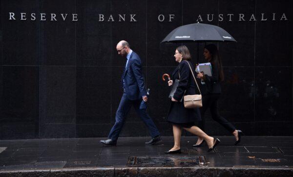Pedestrians walks past the Reserve Bank of Australia in Sydney, Australia, on June 4, 2019. (Peter Parks/AFP via Getty Images)