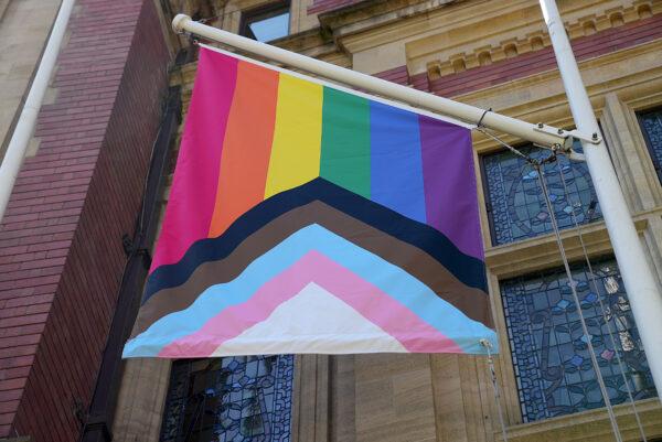 General view of the LGBTQIA+ (lesbian, gay, bisexual, transgender, questioning, intersex, asexual, and agender) flag outside the RICS London Bookshop during UK Pride Month 2021 in London on June 1, 2021. (Edward Smith/ Getty Images)