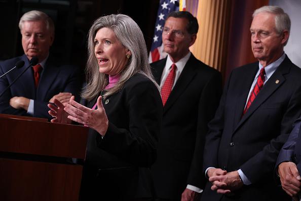 Sen. Joni Ernst (Republican-Iowa, second L) speaks about government spending at a news conference with (L-R) Sen. Lindsey Graham (Republican-South Carolina), Sen. John Barrasso (Republican-Wyoming), and Sen. Ron Johnson (Republican-Wisconsin) at the U.S. Capitol on July 21, 2021. (Chip Somodevilla/Getty Images)