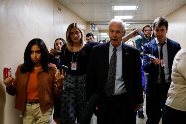 Sen. Ron Johnson (Republican-Wisconsin) walks to the U.S. Capitol on Sept. 8, 2022 in Washington. Senators are working towards an agreement on a short-term spending bill to fund the government and avoid a potential shutdown at the end of the month. (Anna Moneymaker/Getty Images)