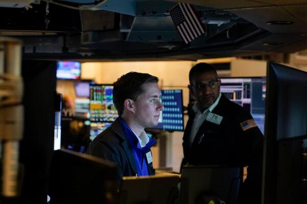 Traders work on the floor at the New York Stock Exchange in New York on Oct. 4, 2022. (Seth Wenig/AP Photo)
