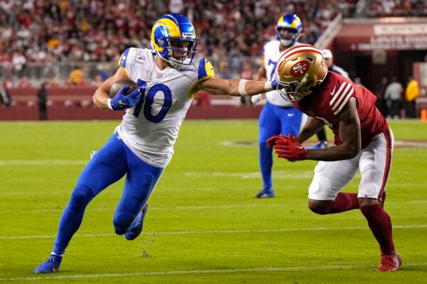 Wide receiver Cooper Kupp (10) of the Los Angeles Rams rushes in front of cornerback Charvarius Ward (7) of the San Francisco 49ers during the third quarter at Levi's Stadium in Santa Clara, Calif., on Oct. 3, 2022. (Thearon W. Henderson/Getty Images)