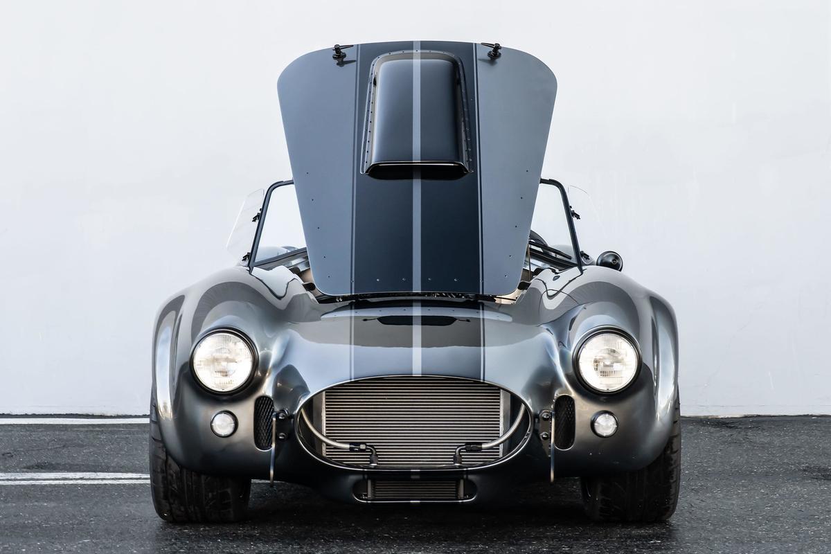 Superformance’s Cobra reproduction is built under license from Carroll Shelby Licensing Inc. to ensure maximum authenticity. (hillbankracing.com)