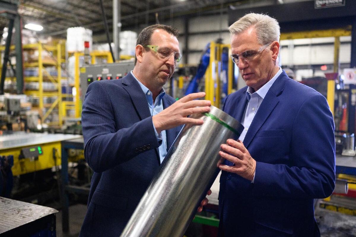 House Minority leader Kevin McCarthy (R-Calif.) looks at HVAC products as he tours DMI Companies in Monongahela, Pa. (Salena Zito)