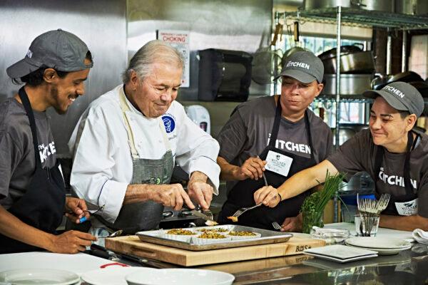 Pépin teaches a cooking class at the Billings Forge Community Works in Hartford, Conn., in 2019, as part of the Jacques Pépin Foundation’s work with culinary training programs across the country. (Courtesy of Jacques Pépin)