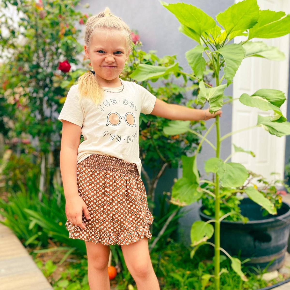 Evelyn in the garden, where she spent much of her time during COVID-19 lockdowns. (Courtesy of <a href="https://www.instagram.com/mykidsaredirtyagain/">Taylor Raine</a>)