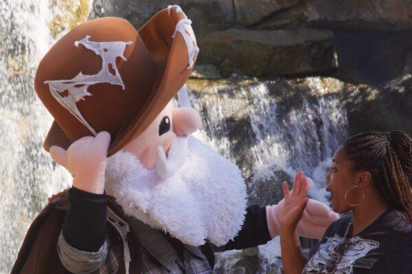 Whittles, the jolly prospector, greets a Knott’s Berry Farm guest. (Courtesy of Karen Gough)