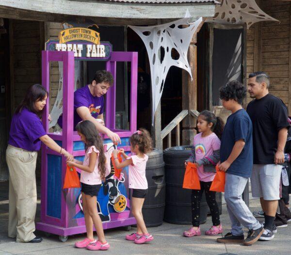 Children collect treats from friendly staff. (Courtesy of Karen Gough)