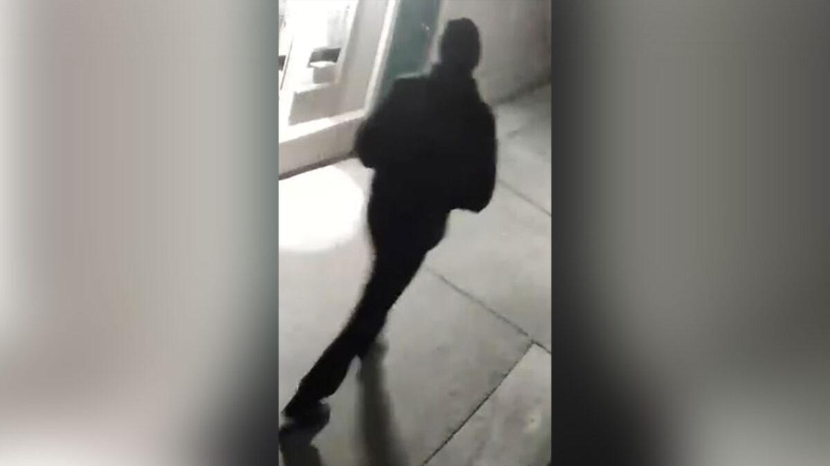 A person is shown from behind, in Stockton, Calif., in an undated surveillance image. (Stockton Police Department via AP)