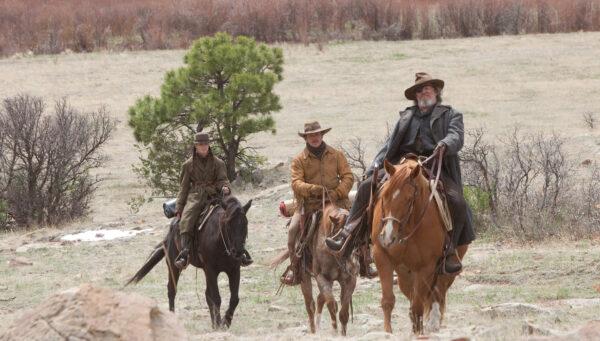 (L–R) Mattie (Hailee Steinfeld), Texas Ranger LaBoeuf (Matt Damon) and Rooster Cogburn (Jeff Bridges) on the trail of the killer of Mattie's father, Tom Chaney, in "True Grit." (Courtesy of Paramount Pictures)